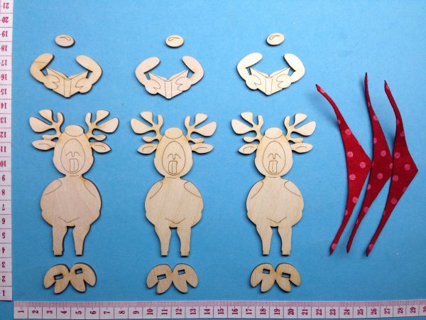 Bastelset aus Holz: 3 Rentier-Sängerknaben Angebot – Bild 3